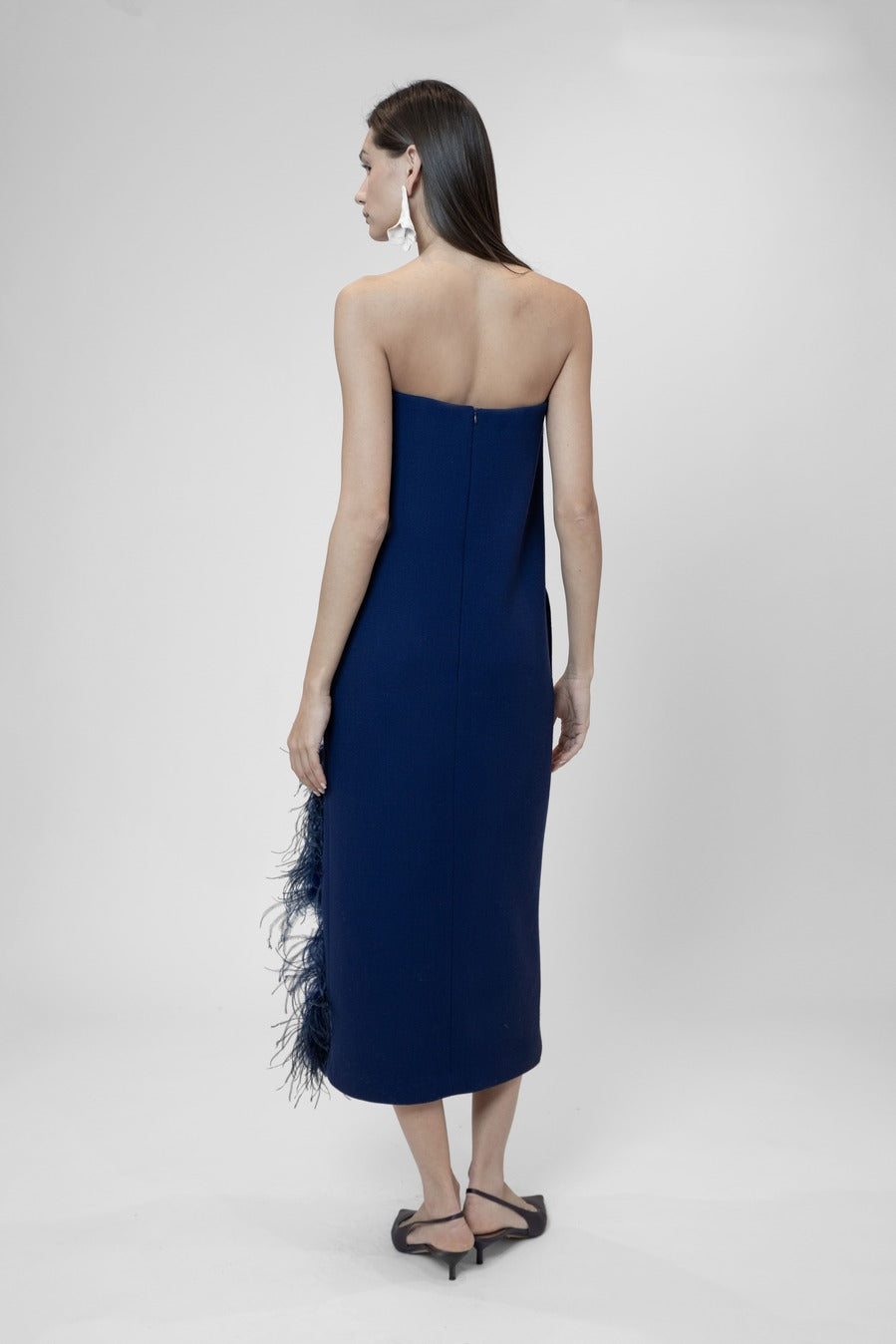 Strapless midi dress with a side slit and feathers